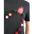 Camiseta pompones